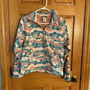The North Face pull over 1/4 zip light weight jacket. Size XS